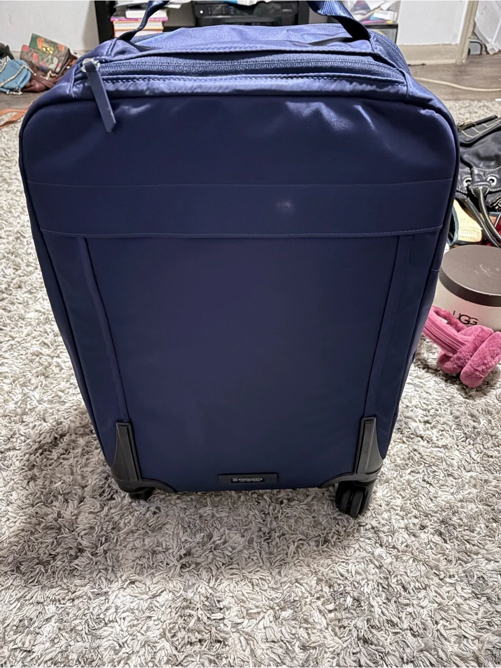 Tumi Carry-On Spinner rolling luggage